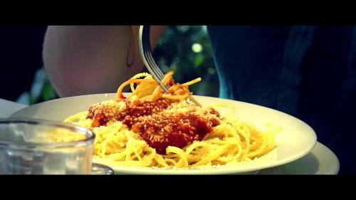a plate of spaghetti with meat sauce and a fork at Hotel San Buenaventura de Atitlán in Panajachel