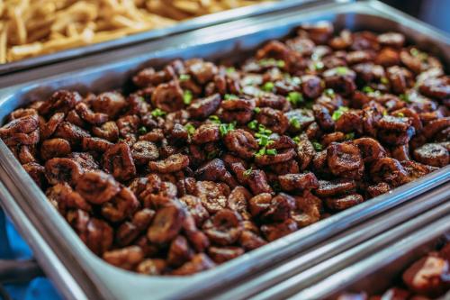 a tray of food with nuts on top at Hotel Triângulo in Caldas Novas