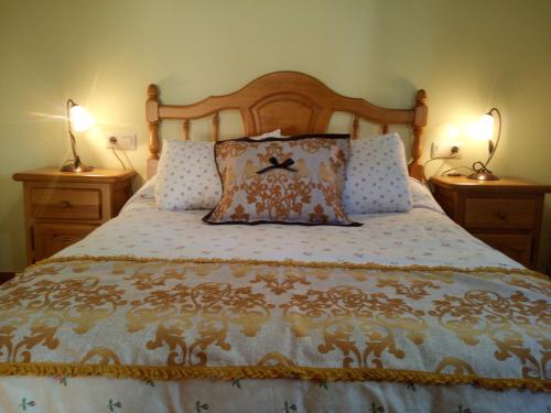 מיטה או מיטות בחדר ב-Casa Rural Las Nieves