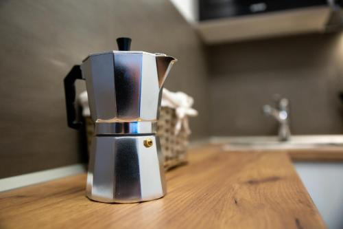 a coffee pot sitting on top of a counter at Apartmán Dagmar in Bešeňová