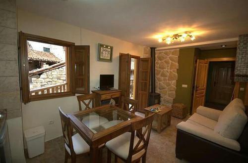TV a/nebo společenská místnost v ubytování APARTAMENTOS RURALES EL PRIVILEGIO