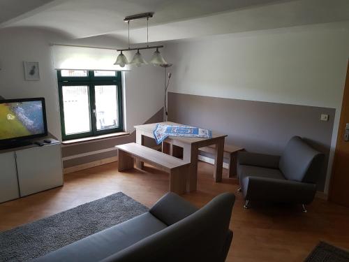 Μια τηλεόραση ή/και κέντρο ψυχαγωγίας στο Ferienhaus Sooß