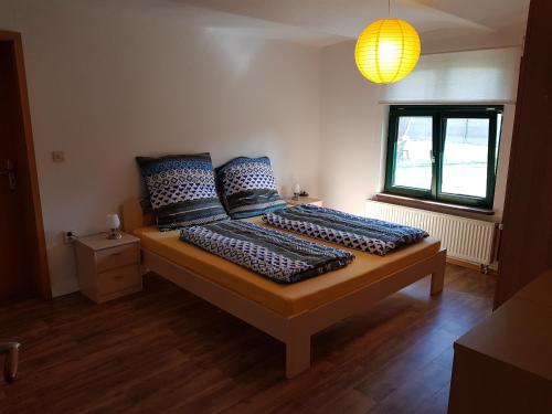 Ліжко або ліжка в номері Ferienhaus Sooß