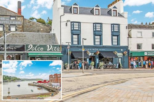 a collage of photos of a street with a building at Imperial Apartment in Oban