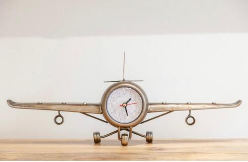 a small airplane sitting on top of a table at COZY APARTMENT IN BRUSSELS in Brussels