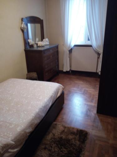 Postel nebo postele na pokoji v ubytování L'Altalena