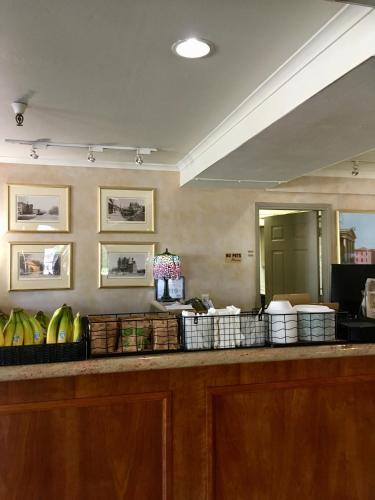 a counter with bananas in baskets on top of it at Hardman House in Carson City