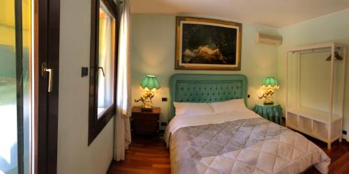 Lova arba lovos apgyvendinimo įstaigoje Villa Fior di Robinia