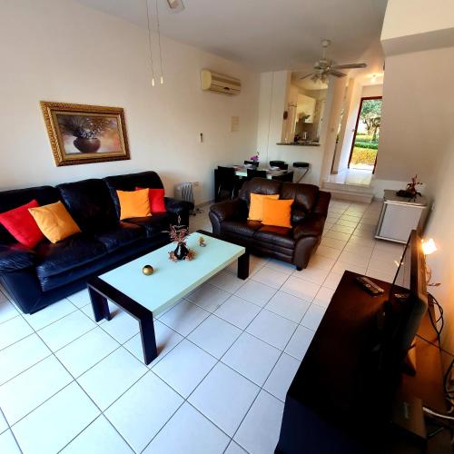 Un lugar para sentarse en Owls Nest Townhouse