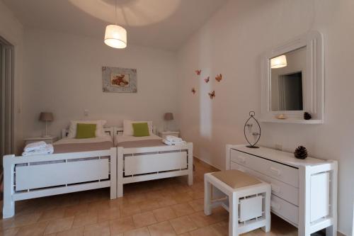 Postel nebo postele na pokoji v ubytování Eftyxia apartments