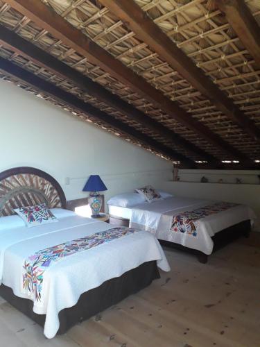 A bed or beds in a room at Rancho Espinoza