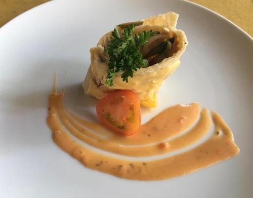 ゲストハウスの敷地内または近くでの食事または食べ物