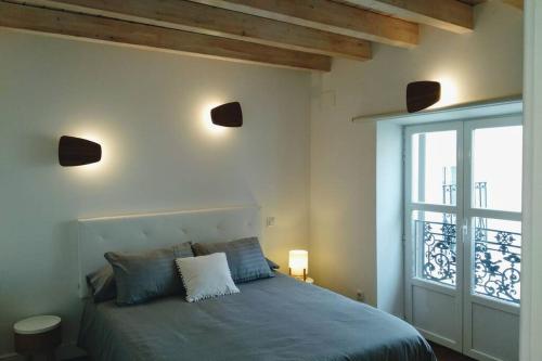 Postel nebo postele na pokoji v ubytování TU HOGAR EN EL CAMINO. BURGOS CENTRO. VUT. WIFI