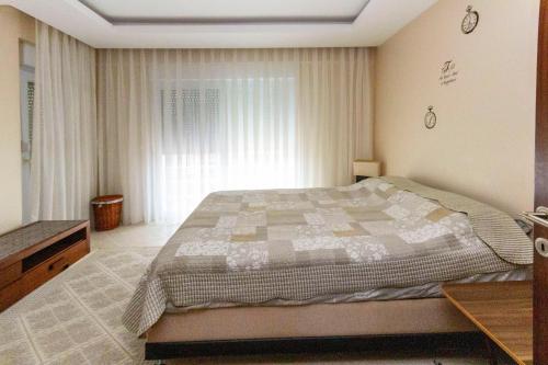 Katil atau katil-katil dalam bilik di Paradise Town Villa Marina