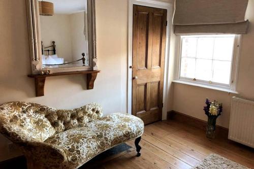 Кровать или кровати в номере Dunsley Cottage