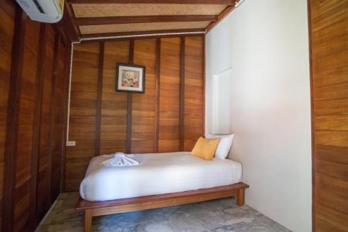 Un ou plusieurs lits dans un hébergement de l'établissement 100 Islands Resort & Spa