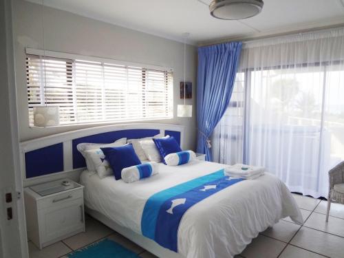Cama o camas de una habitación en CodsView Beach House