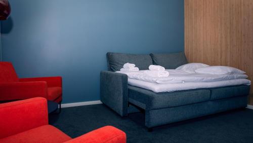 Säng eller sängar i ett rum på Narvik Hotel Wivel