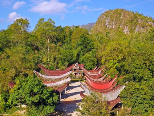 an overhead view of a temple in a forest at Ne Pakku Manja Family Home in Rantepao