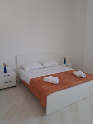 Postel nebo postele na pokoji v ubytování Villa Fredi