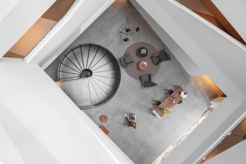 an overhead view of a office with a table and chairs at briig boutique hotel in Split
