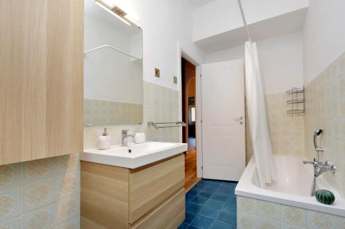 Ванная комната в Magliana Apartment