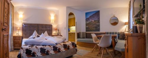 Säng eller sängar i ett rum på Hotel Landhaus Carla