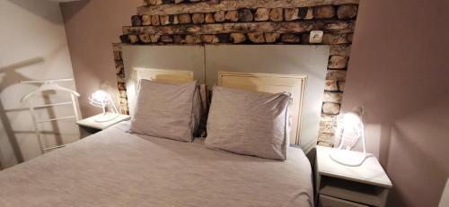 Postel nebo postele na pokoji v ubytování Hotel Heere