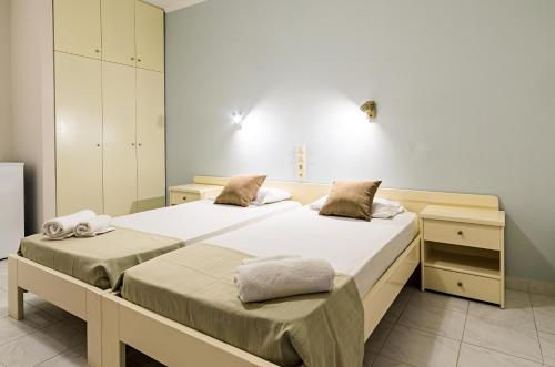 Кровать или кровати в номере Karras Livin
