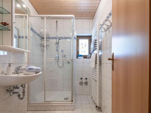 a bathroom with a shower and a sink at Gästehaus Maria in Bad Rippoldsau-Schapbach