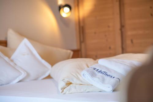 Ένα ή περισσότερα κρεβάτια σε δωμάτιο στο Hotel Torgglerhof