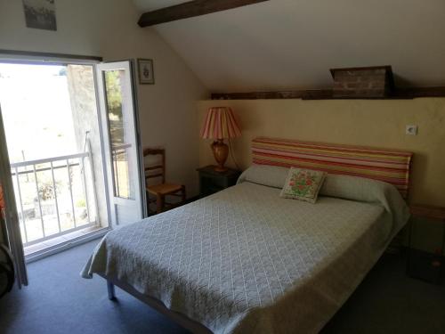 Кровать или кровати в номере Gîte des Cantines