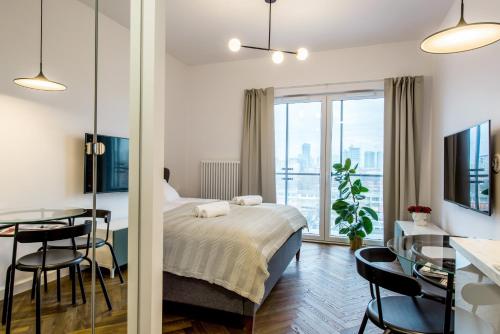 Ένα ή περισσότερα κρεβάτια σε δωμάτιο στο Marmo Apartments
