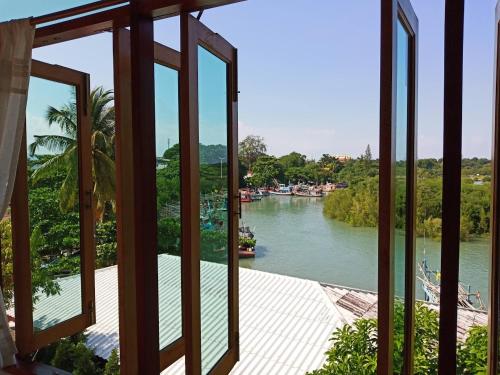 a view of a river from a window at Yen~Yen B&B in Prachuap Khiri Khan