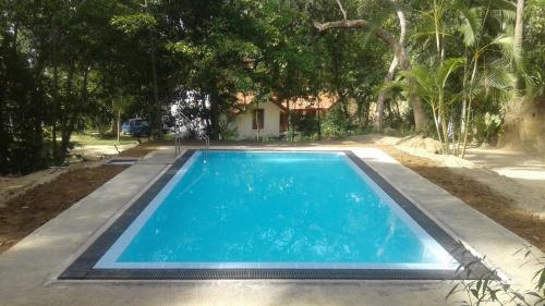 Bazén v ubytování Kandy Spice Villa nebo v jeho okolí