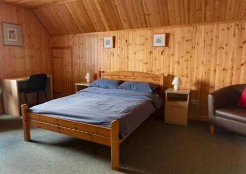 En eller flere senge i et værelse på Gairloch Sands Youth Hostel