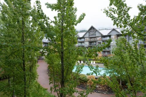 an aerial view of an apartment complex with trees at The Aspens by Whistler Premier in Whistler