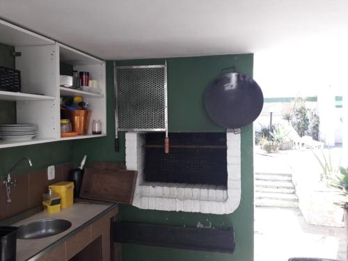A cozinha ou cozinha compacta de Casa Confortável