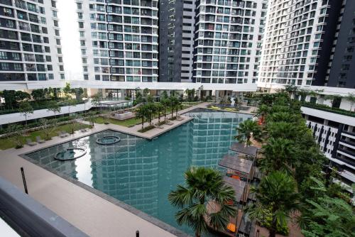 an overhead view of a swimming pool in a building at 3 Rooms Elegant Minimalist Design Setapak 15min KLCC in Kuala Lumpur