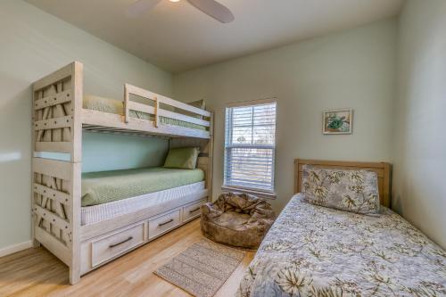 Poschodová posteľ alebo postele v izbe v ubytovaní Mermaid Manor