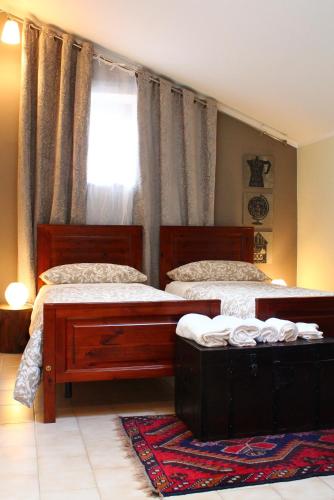 Ένα ή περισσότερα κρεβάτια σε δωμάτιο στο LA CASA DI NEH