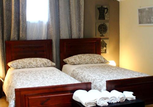 Ένα ή περισσότερα κρεβάτια σε δωμάτιο στο LA CASA DI NEH