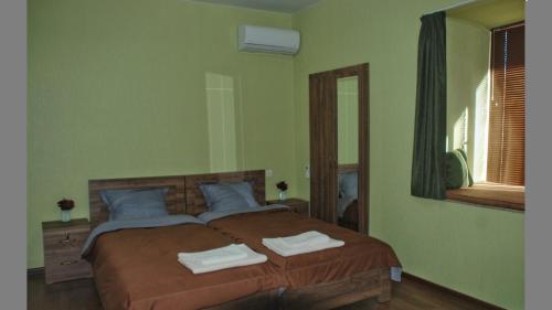 Postel nebo postele na pokoji v ubytování Guesthouse Amarela