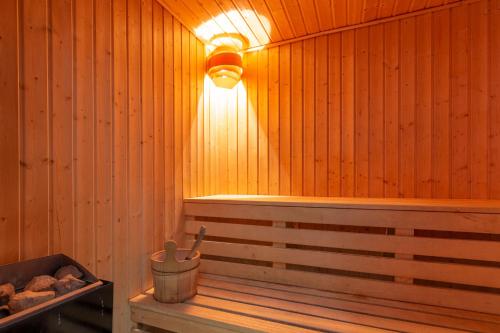 a sauna with a light on top of it at Ski Hotel in Žabljak