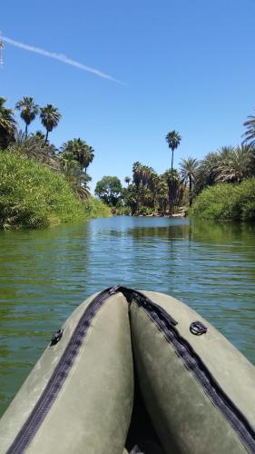 a close up of the front of a boat on a river at Rancho Espinoza in Paredones