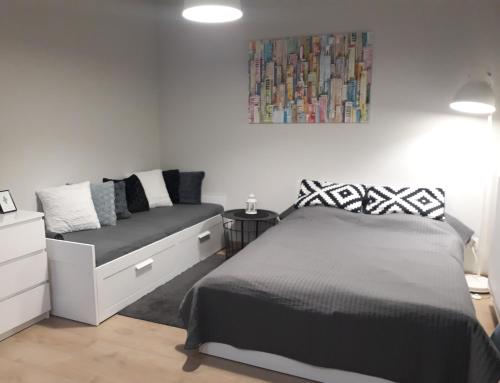 Voodi või voodid majutusasutuse Willa Ogrodowa toas