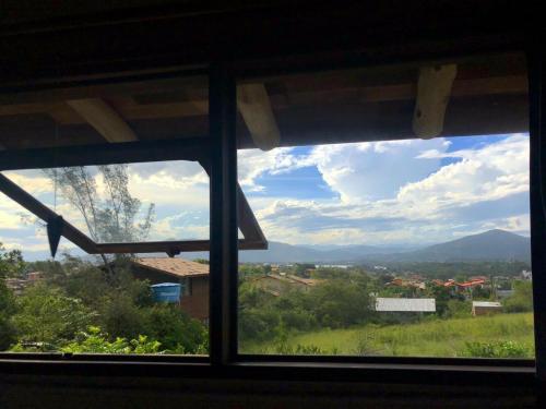 a view from a window of a city at Pousada Gopak in Praia do Rosa