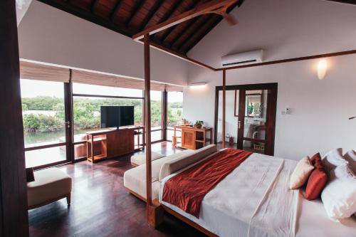 Postel nebo postele na pokoji v ubytování Anantaya Resort & Spa Chilaw