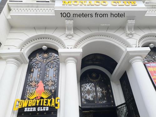 a building with two stained glass windows on it at T&M Luxury Hotel Hanoi in Hanoi
