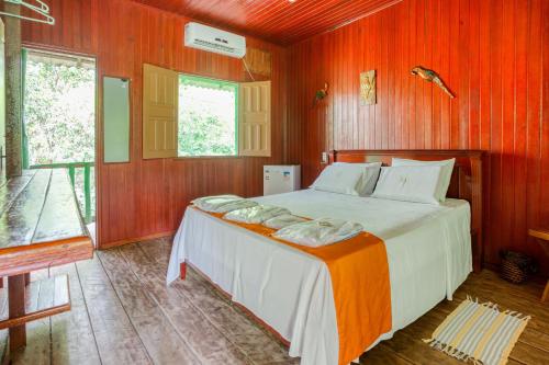 Vuode tai vuoteita majoituspaikassa Amazonia Jungle Hotel